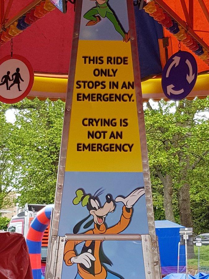 Photo of a rollercoaster with a big sign: "THIS RIDE ONLY STOPS IN AN EMERGENCY. CRYING IS NOT AN EMERGENCY"